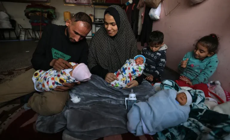 A pregnant woman who escaped Israeli attacks and went to southern Gaza has given birth to four children.